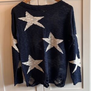 NWOT Women’s Navy Star Pattern Lightweight Distressed Bottom Hem Sweater
